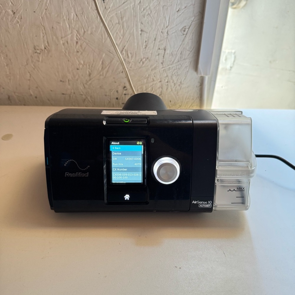 ResMed Device with Digital Display and Silver Dial